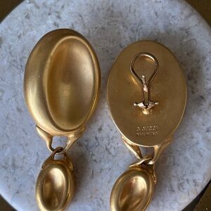 Gucci Luxurious Gold Oval Clip-On Earrings